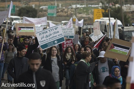 Crowd-marching-other-way